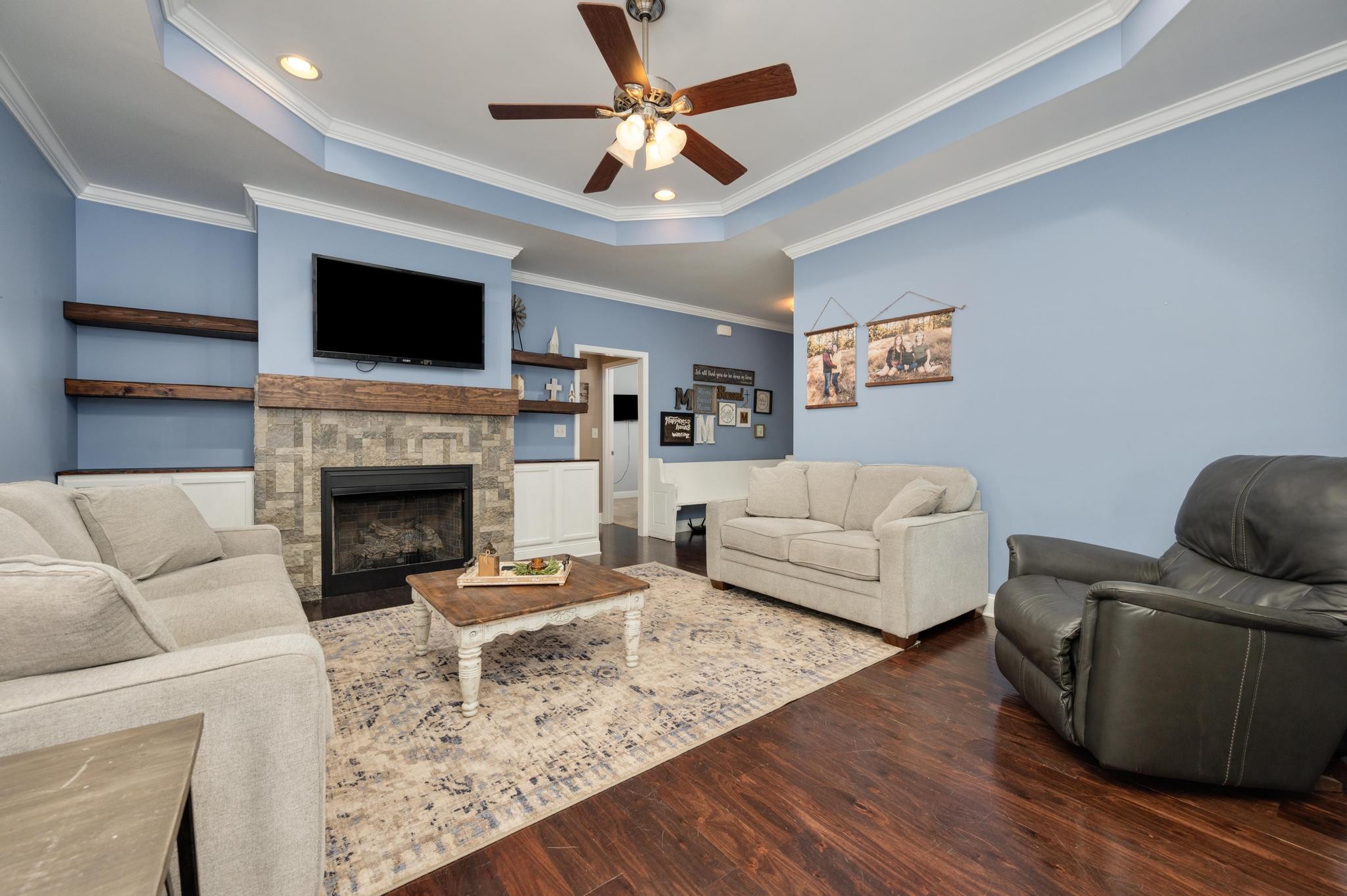 16 Shasteen Ridge Road Lynchburg, TN 37352 - Photo 15 of 55 a living room with furniture fireplace and flat screen tv