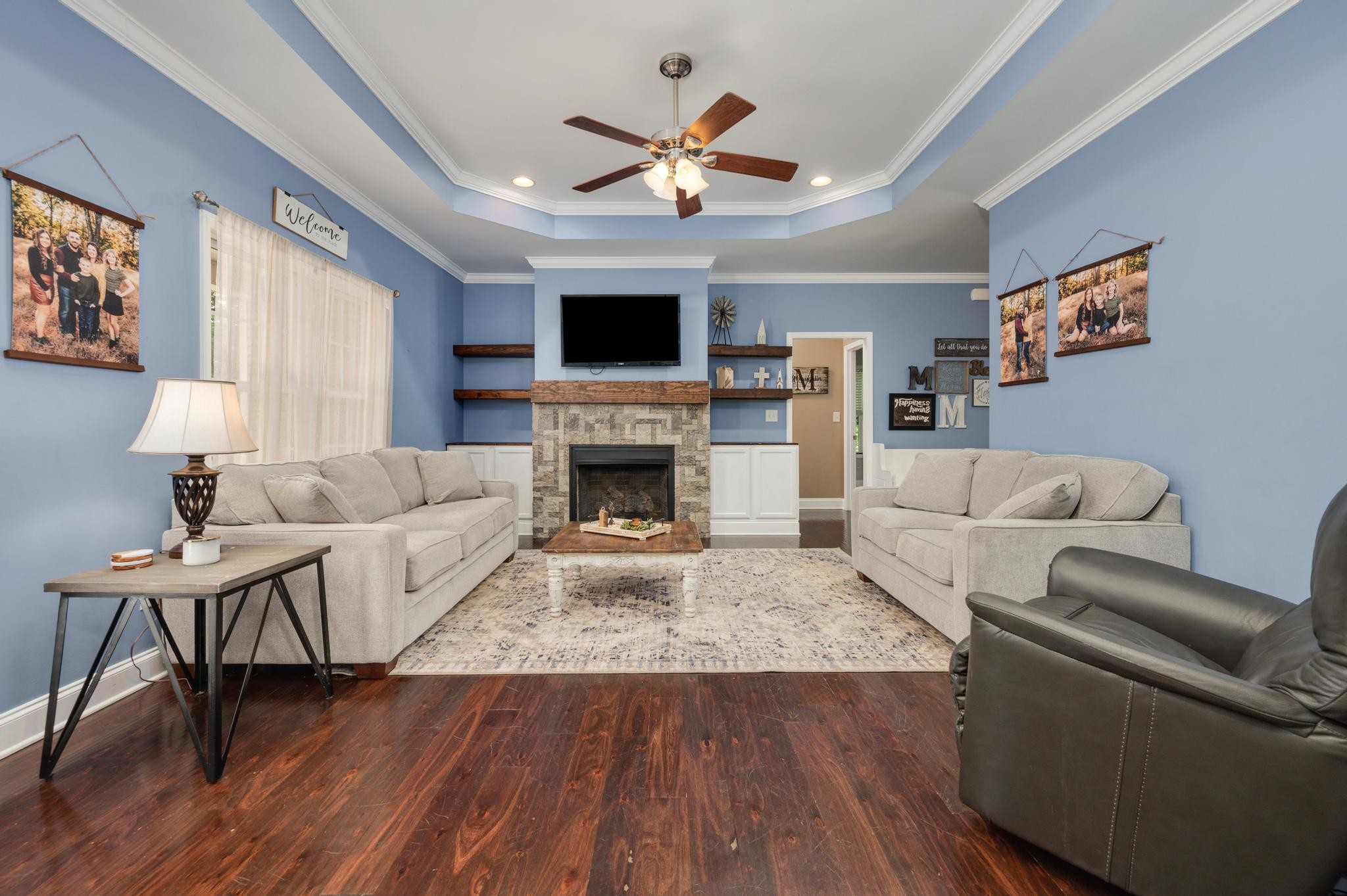 16 Shasteen Ridge Road Lynchburg, TN 37352 - Photo 16 of 55 a living room with furniture fireplace and a flat screen tv