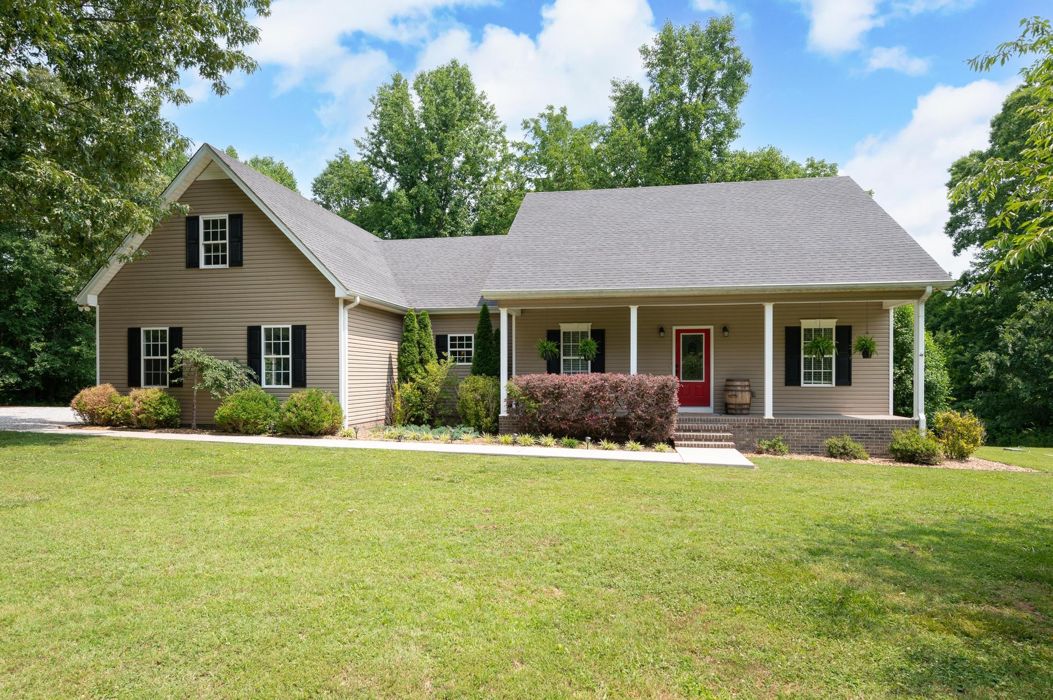 16 Shasteen Ridge Road Lynchburg, TN 37352 - Photo 3 of 55 a front view of house with yard and green space