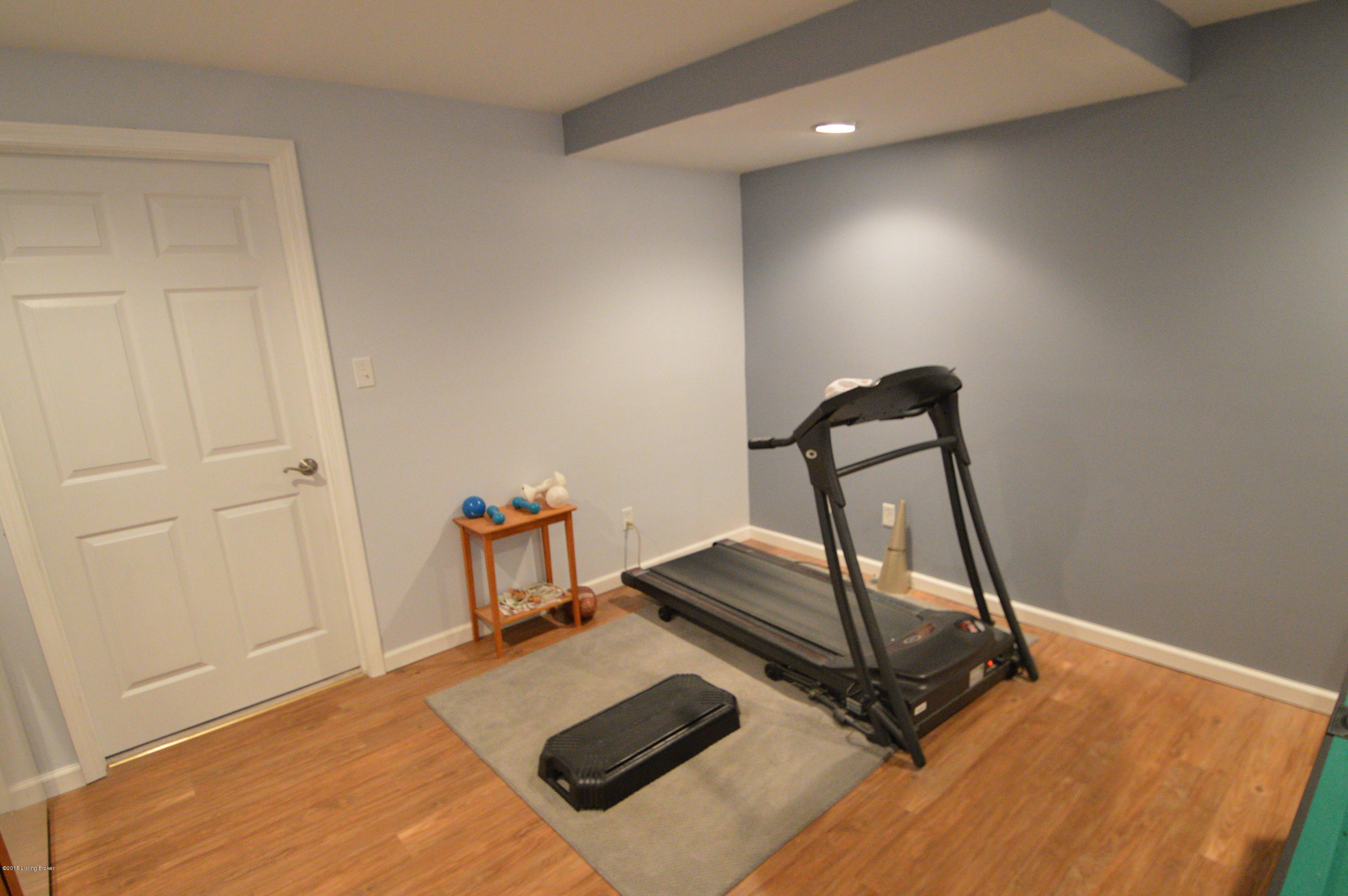 406 Old Towne Road Louisville, KY 40214 - Photo 16 of 49 Room enough in the Family room for an exercise area too.