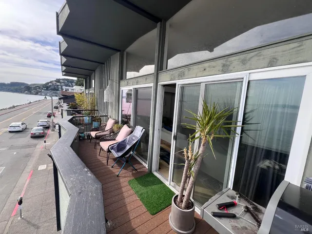 a living room with patio furniture