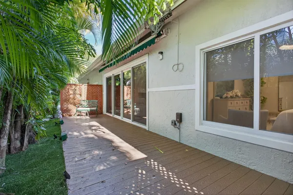 an aerial view of residential house with outdoor space and swimming pool