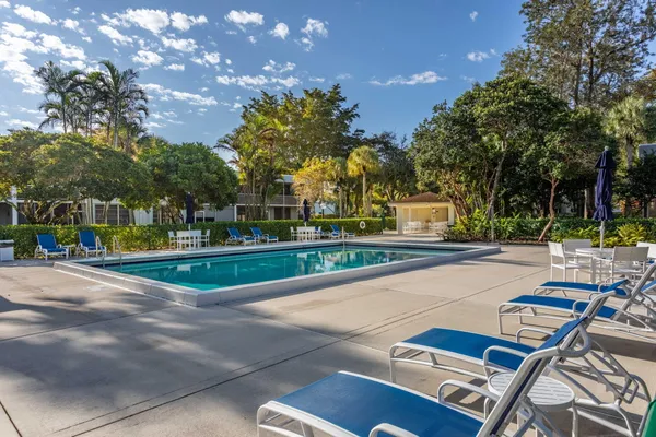 a view of a wrought iron fences in front of house