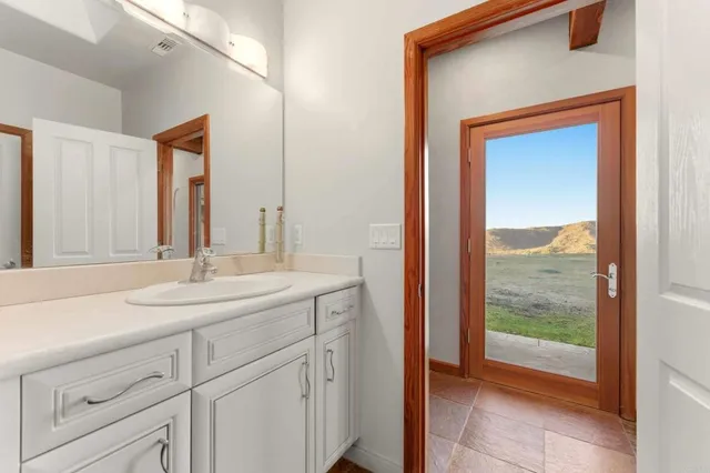 a bathroom with a tub and a shower