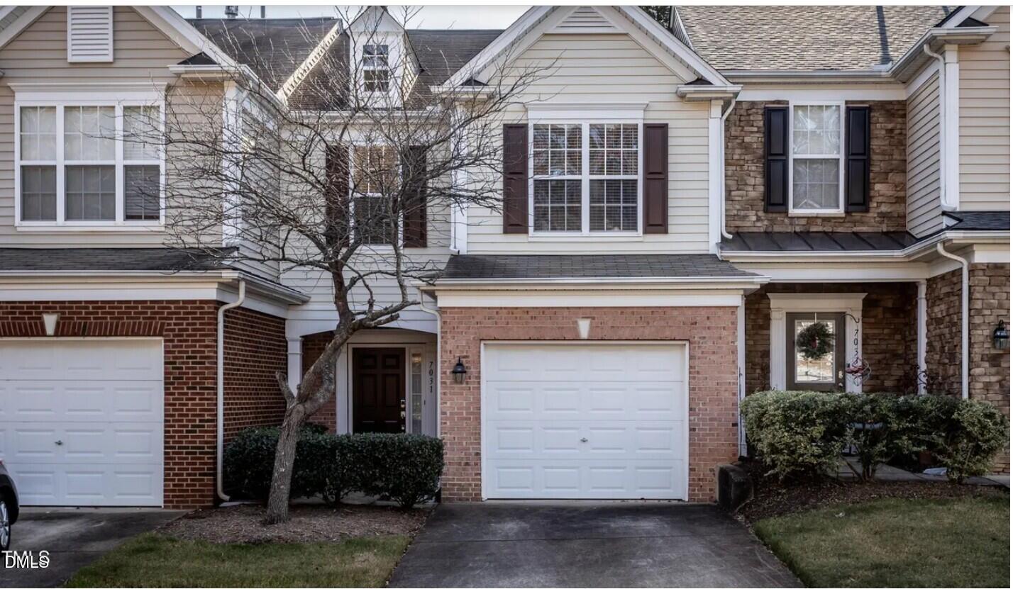 7031 Racine Way Raleigh, NC 27615 - Photo 1 of 24 front view of a house