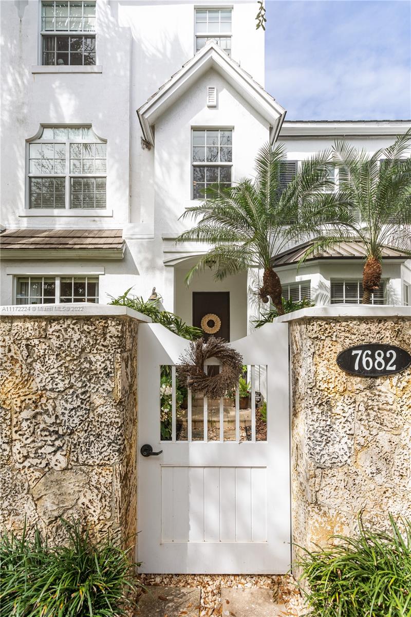 7682 Southwest 54th Avenue Miami, FL 33143 - Photo 1 of 37 front view of a building with a window