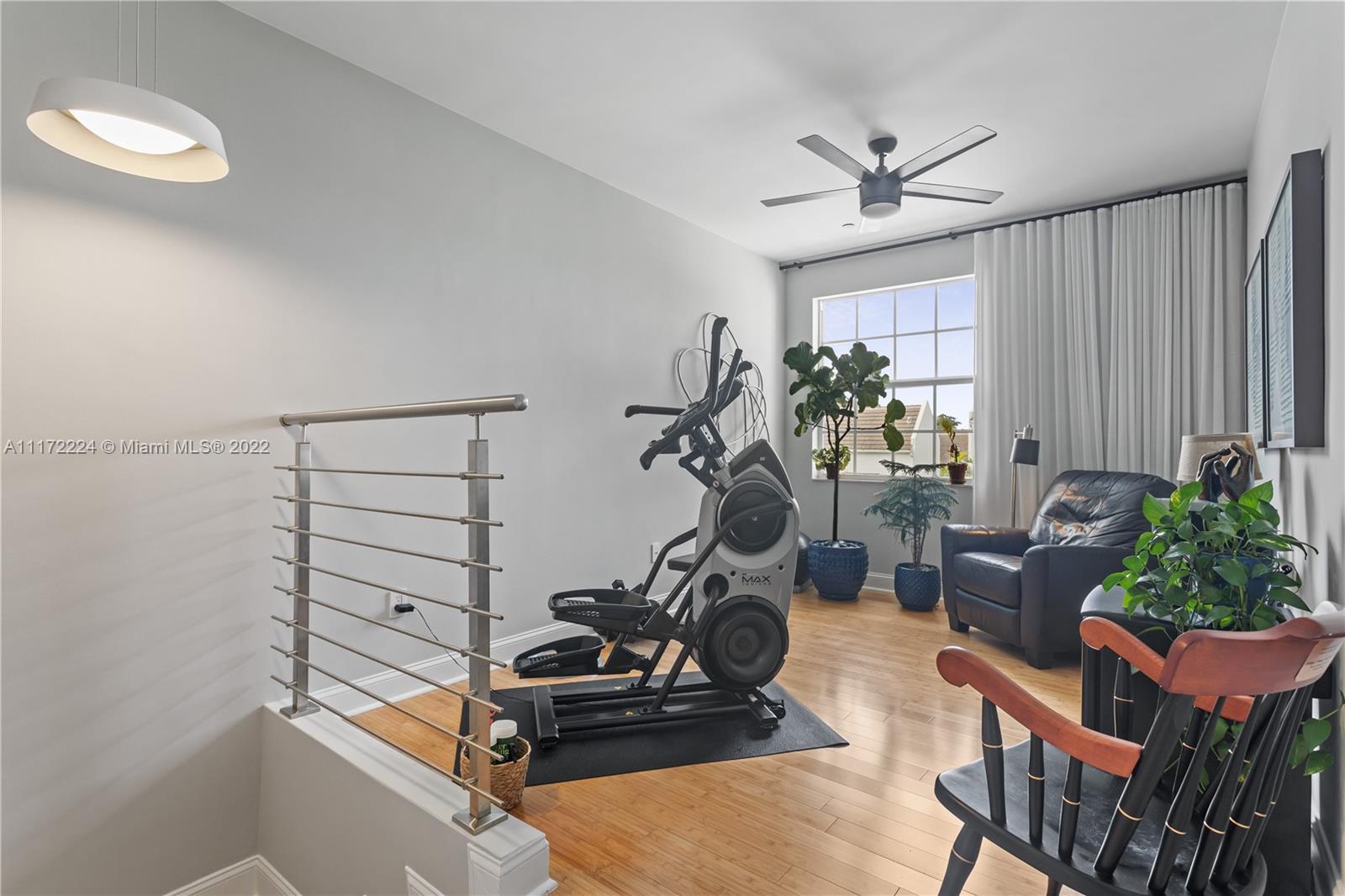7682 Southwest 54th Avenue Miami, FL 33143 - Photo 22 of 37 a view of a workspace with furniture and a window
