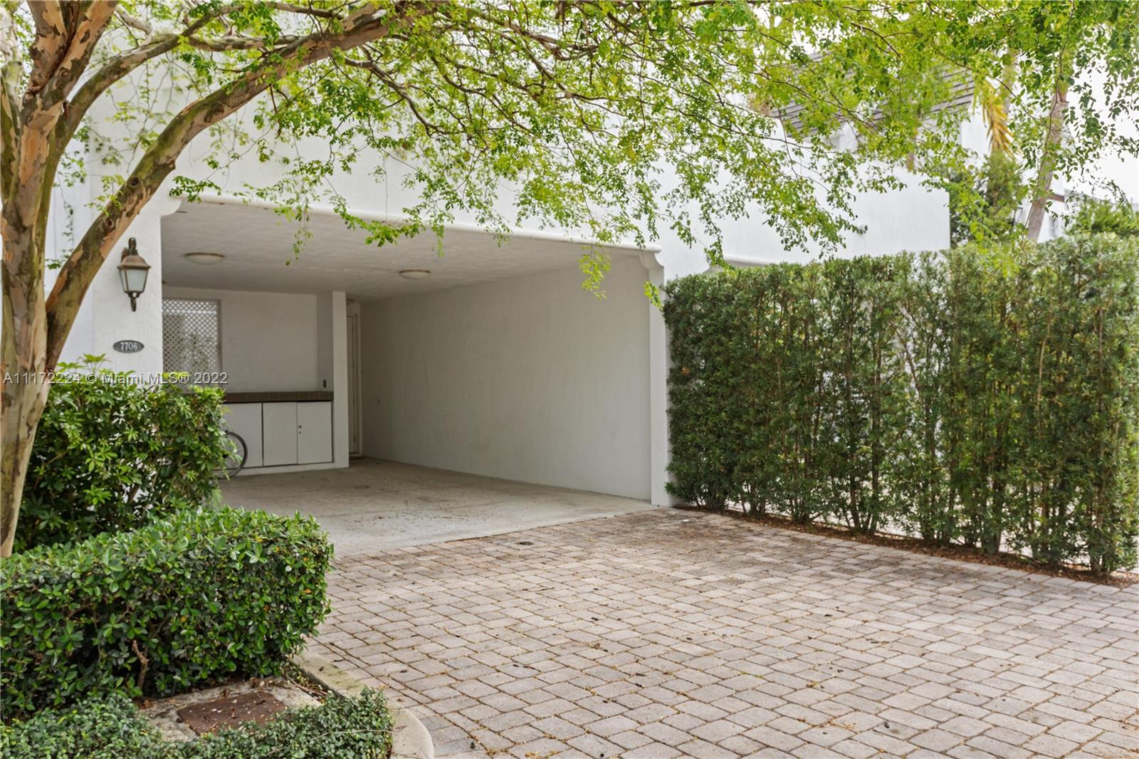 7682 Southwest 54th Avenue Miami, FL 33143 - Photo 33 of 37 front view of a house with a tree