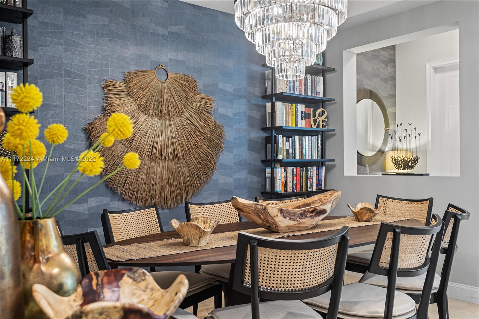 7682 Southwest 54th Avenue Miami, FL 33143 - Photo 6 of 37 a dining room filled with furniture and chandelier