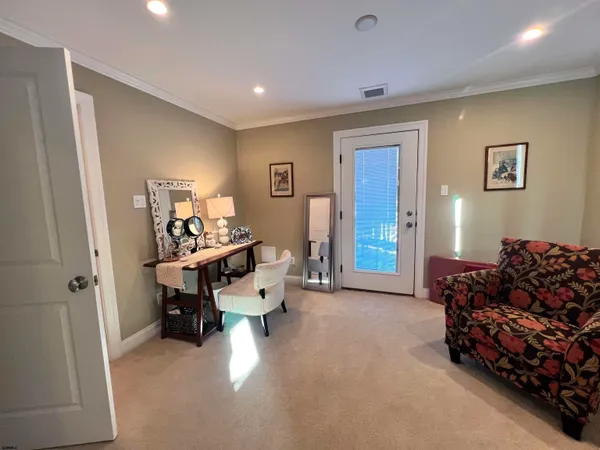 a bed room with furniture and a window