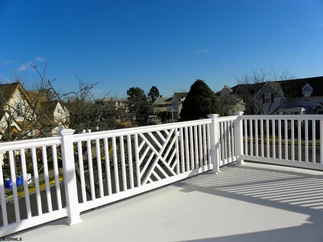 a view of a street from a balcony