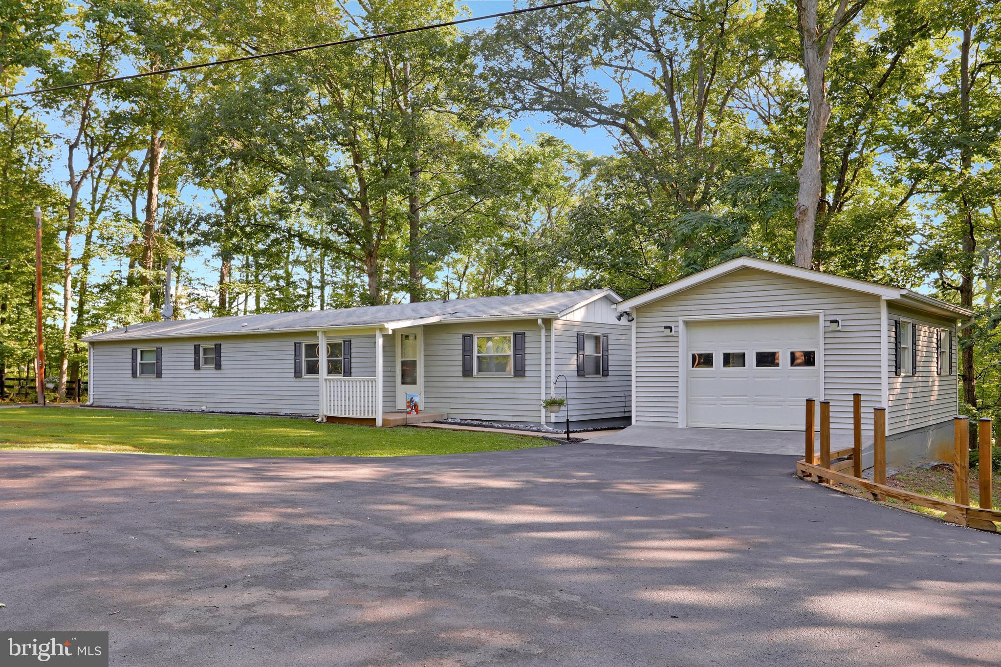 Spacious one level home on 1.63 acres with garage