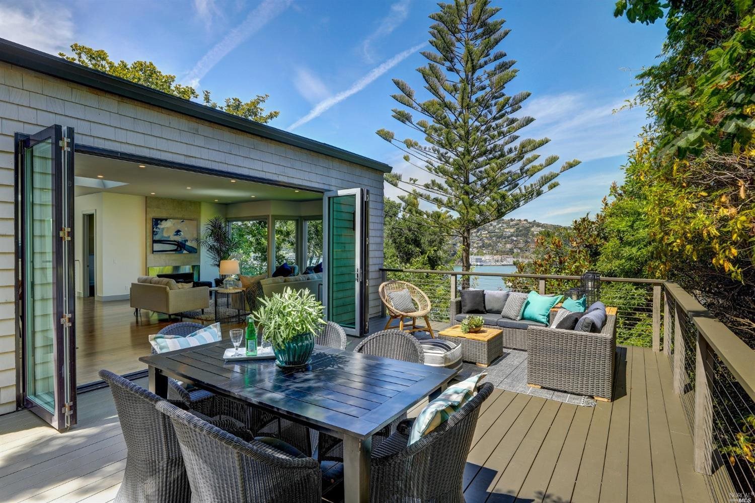 290 Beach Road Belvedere, CA 94920 - Photo 1 of 1 a view of a patio with a table and chairs