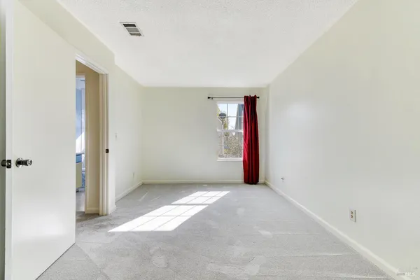 an empty room with an entryway