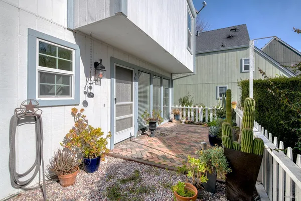 a front view of a house with patio