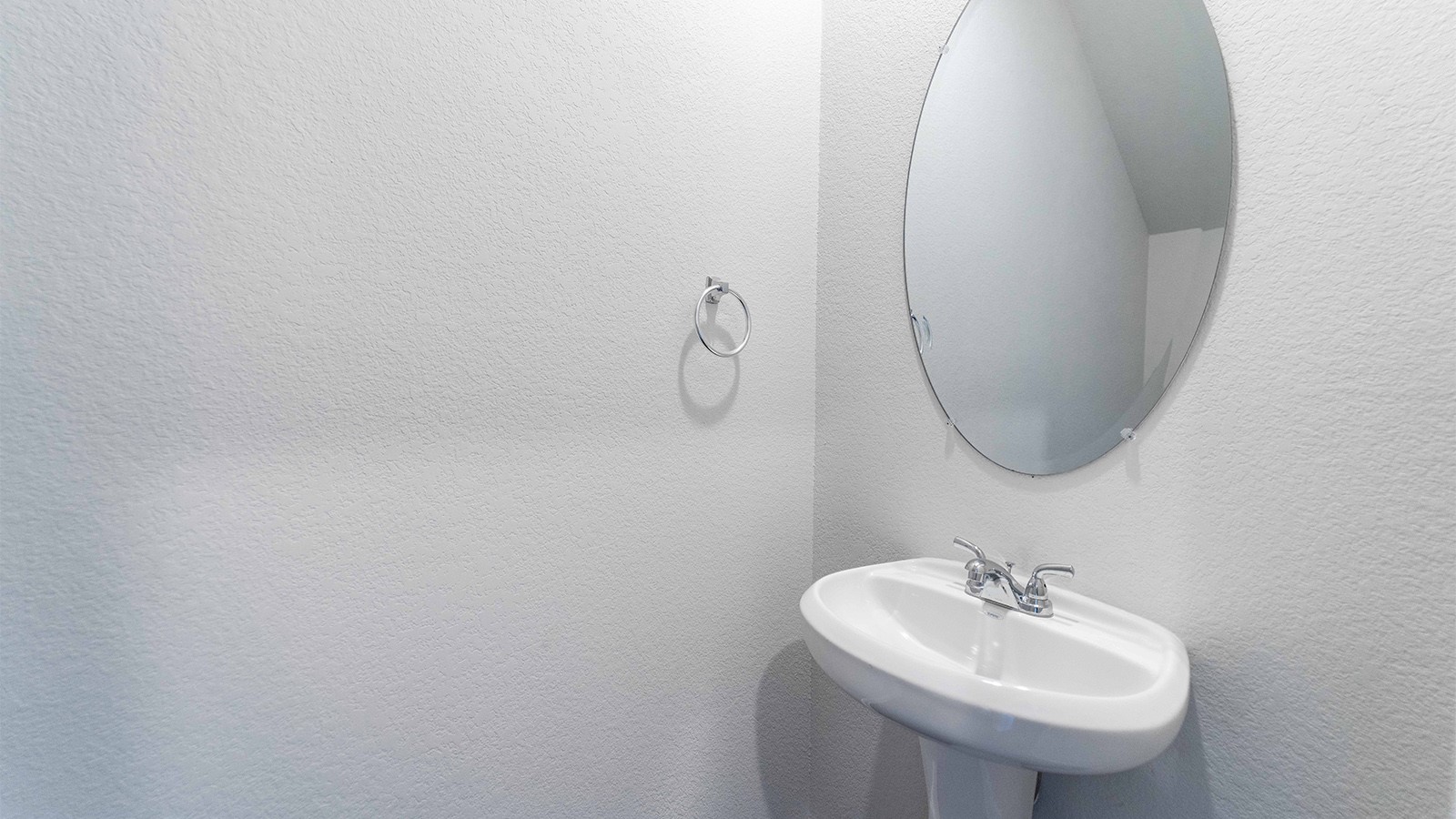 22003 Blue Sky Way New Caney, TX 77357 - Photo 14 of 15 a bathroom with a sink and a mirror