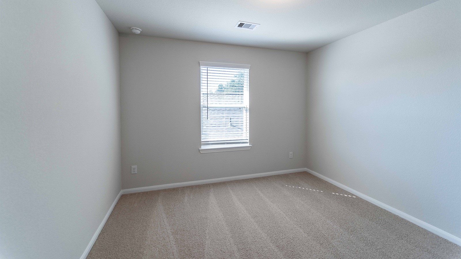 22003 Blue Sky Way New Caney, TX 77357 - Photo 15 of 15 an empty room with a window