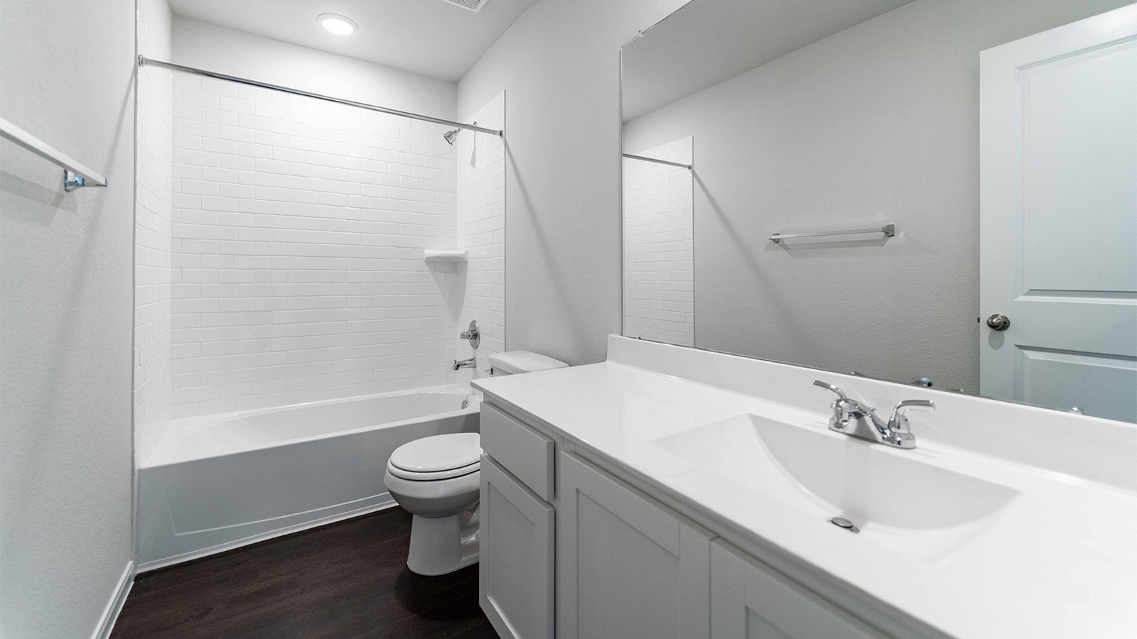 22003 Blue Sky Way New Caney, TX 77357 - Photo 2 of 15 a bathroom with a sink a toilet and shower