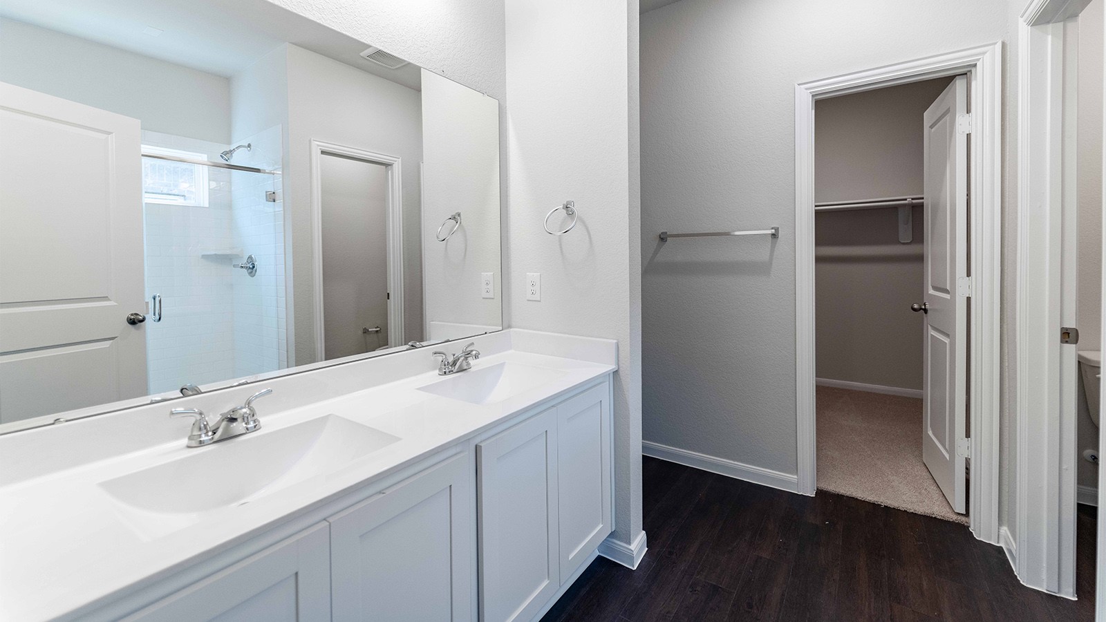 22003 Blue Sky Way New Caney, TX 77357 - Photo 5 of 15 a bathroom with a double vanity sink and mirror