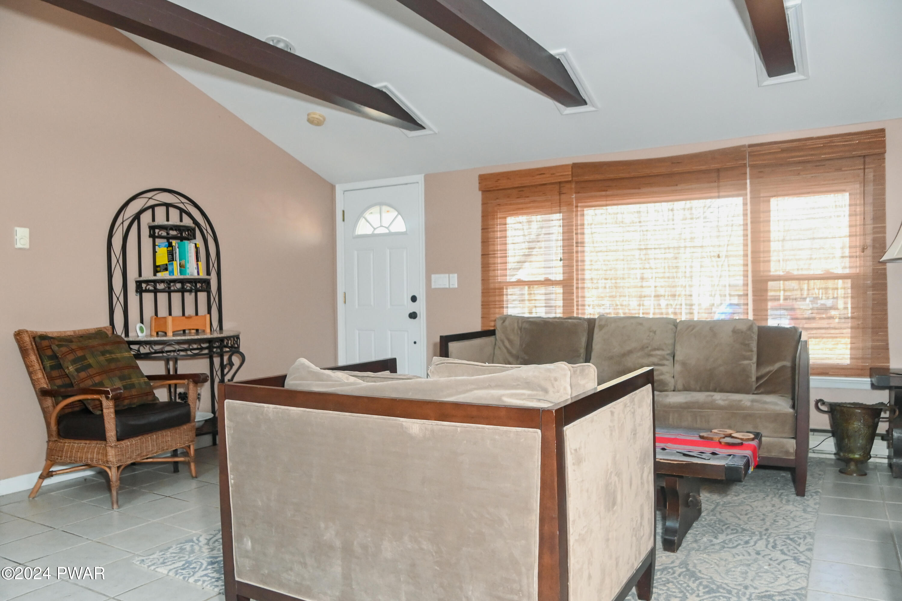 119 Pike Road Bushkill, PA 18324 - Photo 3 of 16 a room with furniture and a window