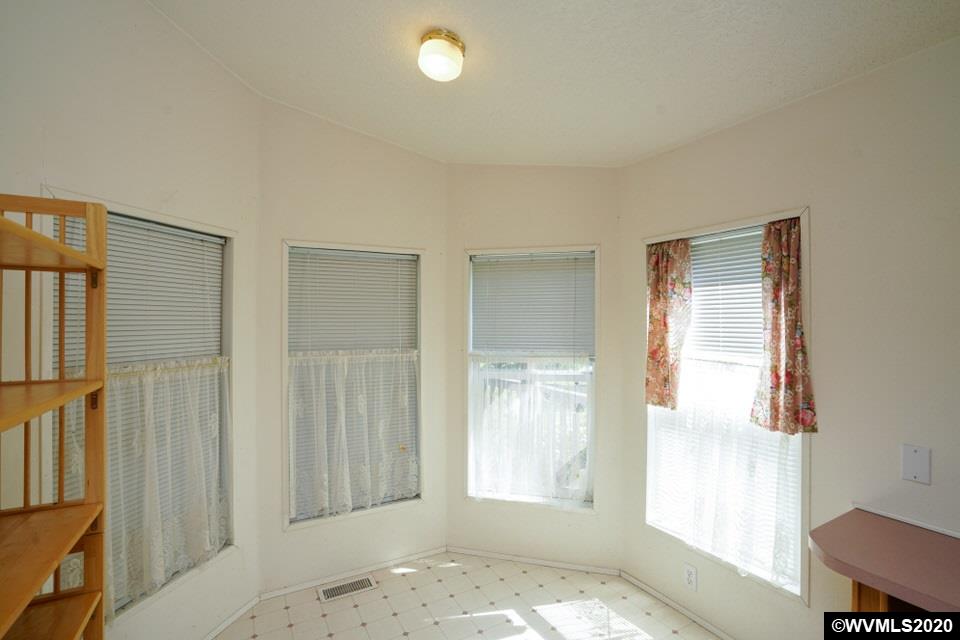 17265 Butler Hill Road Dallas, OR 97338 - Photo 24 of 38 a view of livingroom with hardwood floor and window