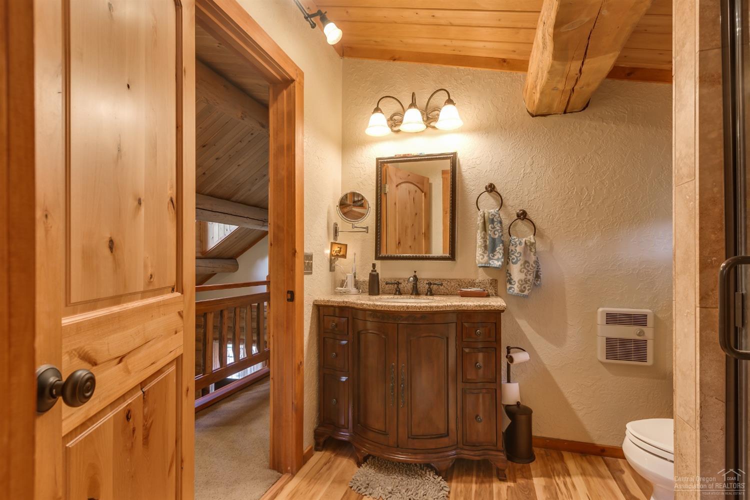 19375 Mohawk Road Bend, OR 97702 - Photo 17 of 25 a bathroom with a sink and a mirror