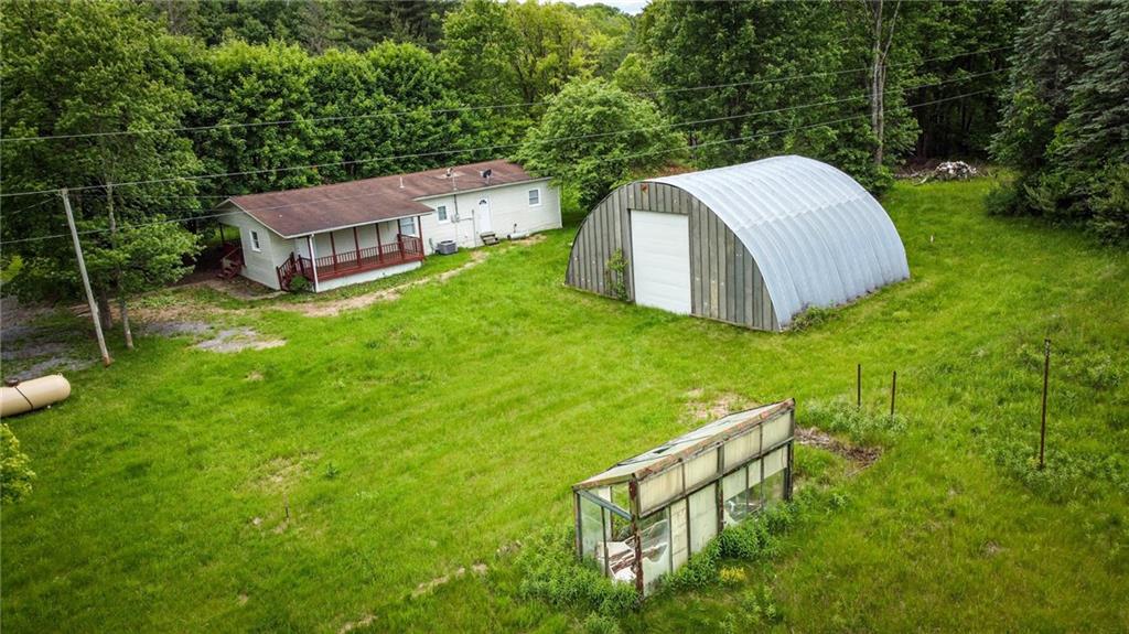 1975 Oneida Valley Road Karns City, PA 16041 - Photo 35 of 35 a view of a backyard with a sitting area and a garden