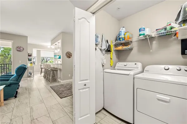 a view of kitchen and utility room