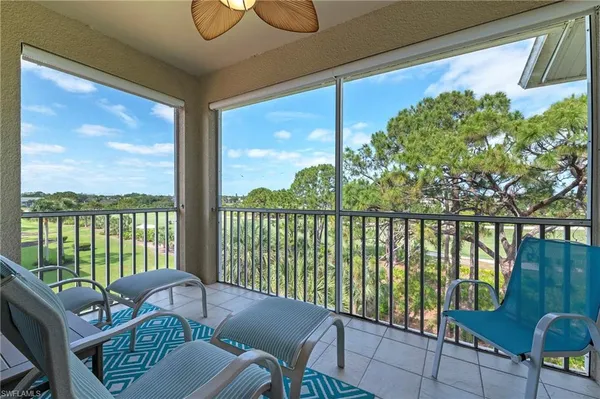 a balcony with furniture