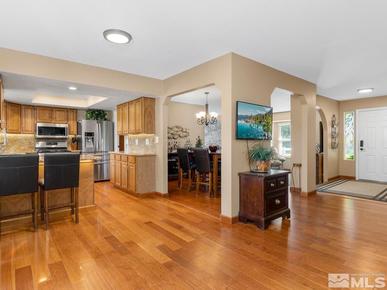 10060 Raintree Court Reno, NV 89511 - Photo 12 of 37 a view of kitchen with furniture and refrigerator