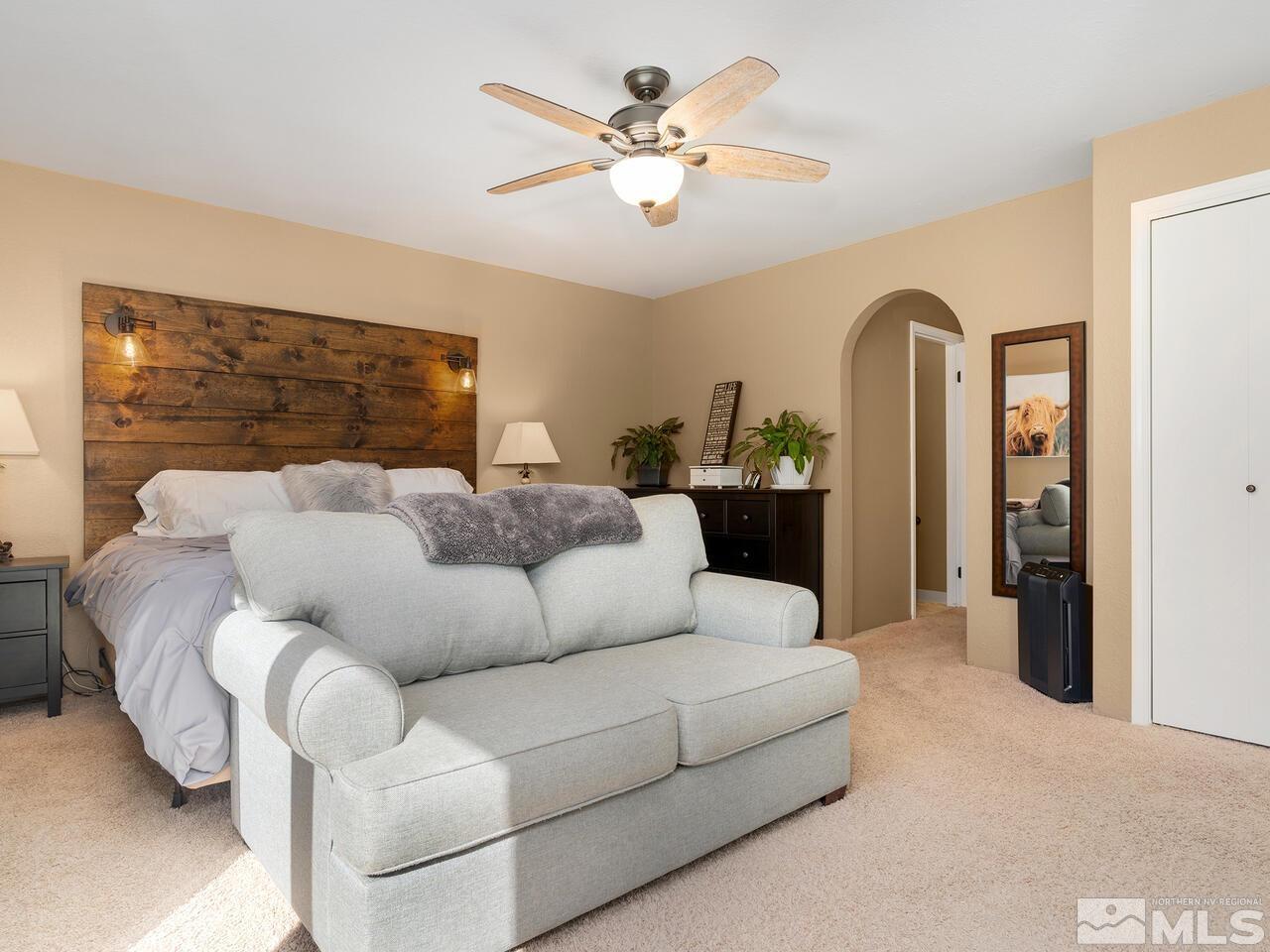 10060 Raintree Court Reno, NV 89511 - Photo 16 of 37 a living room with furniture and ceiling fan