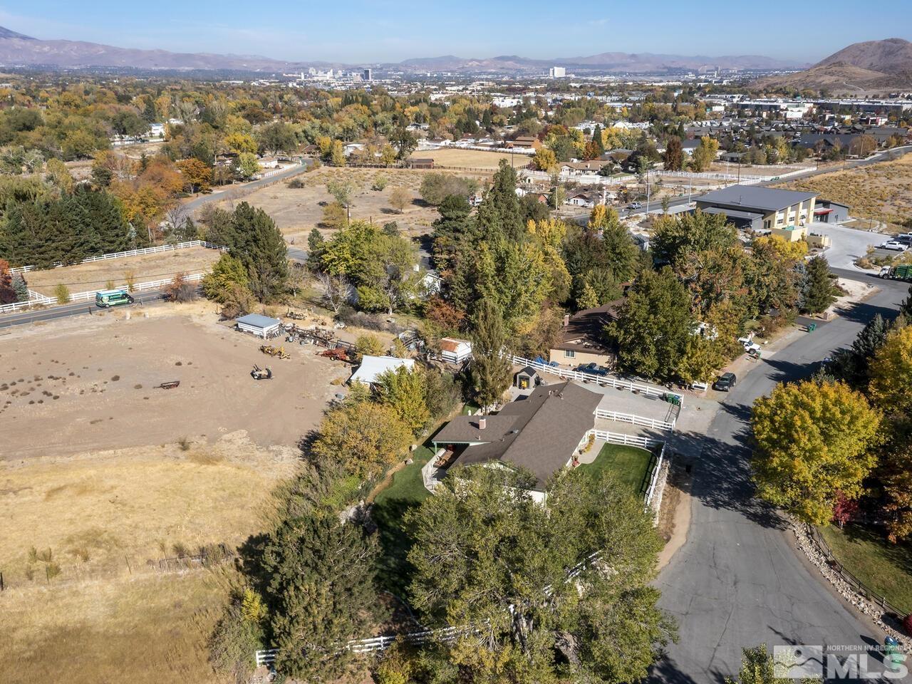 10060 Raintree Court Reno, NV 89511 - Photo 2 of 37 an aerial view of residential houses with outdoor space