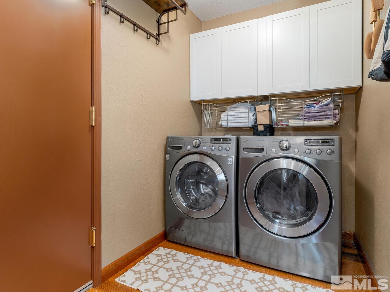 10060 Raintree Court Reno, NV 89511 - Photo 23 of 37 a utility room with dryer and washer