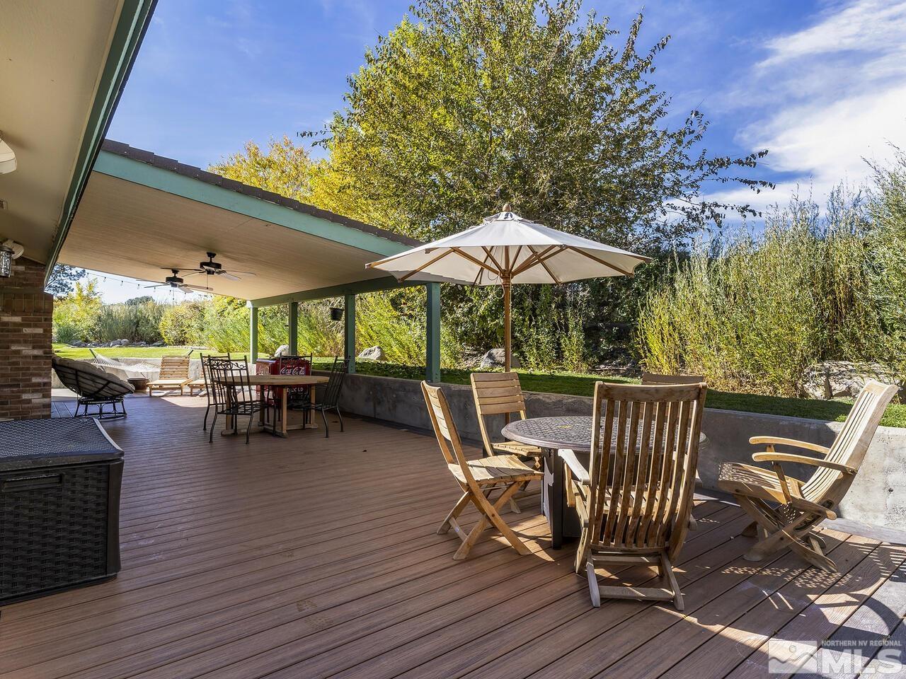 10060 Raintree Court Reno, NV 89511 - Photo 25 of 37 a view of chairs and tables in the patio