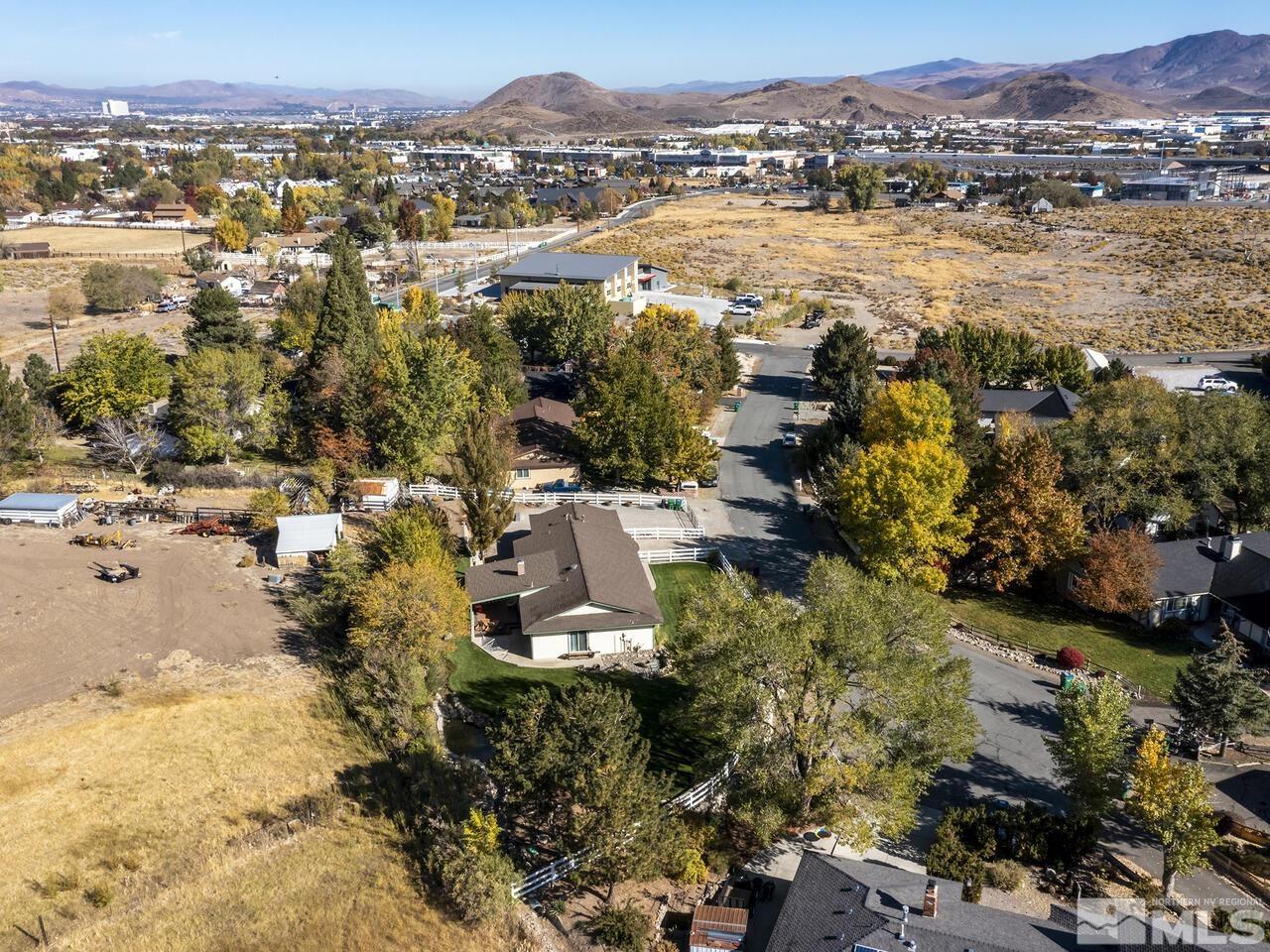 10060 Raintree Court Reno, NV 89511 - Photo 32 of 37 an aerial view of ocean and residential houses with outdoor space