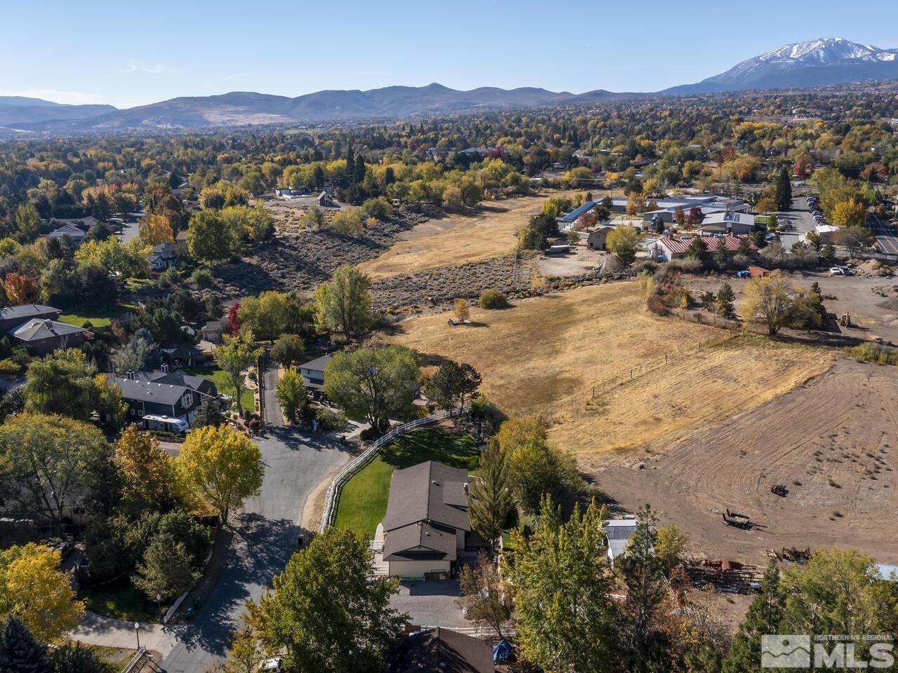 10060 Raintree Court Reno, NV 89511 - Photo 34 of 37 an aerial view of residential houses with outdoor space