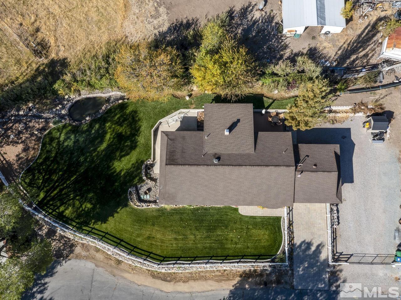 10060 Raintree Court Reno, NV 89511 - Photo 37 of 37 an aerial view of a house with a yard