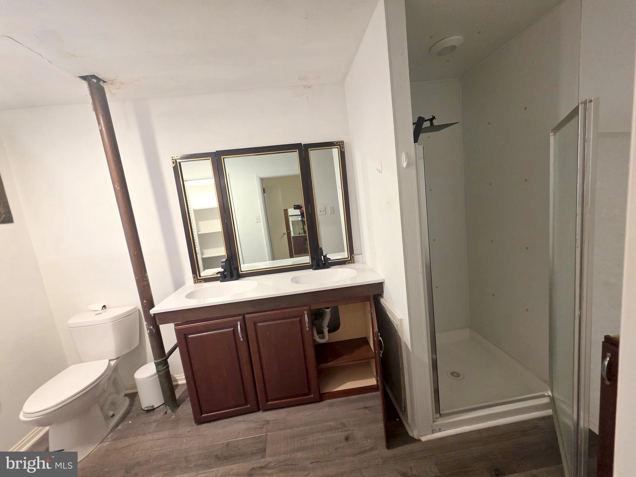17 Cardinal Drive Moorestown, NJ 08057 - Photo 3 of 16 a bathroom with a sink and a mirror