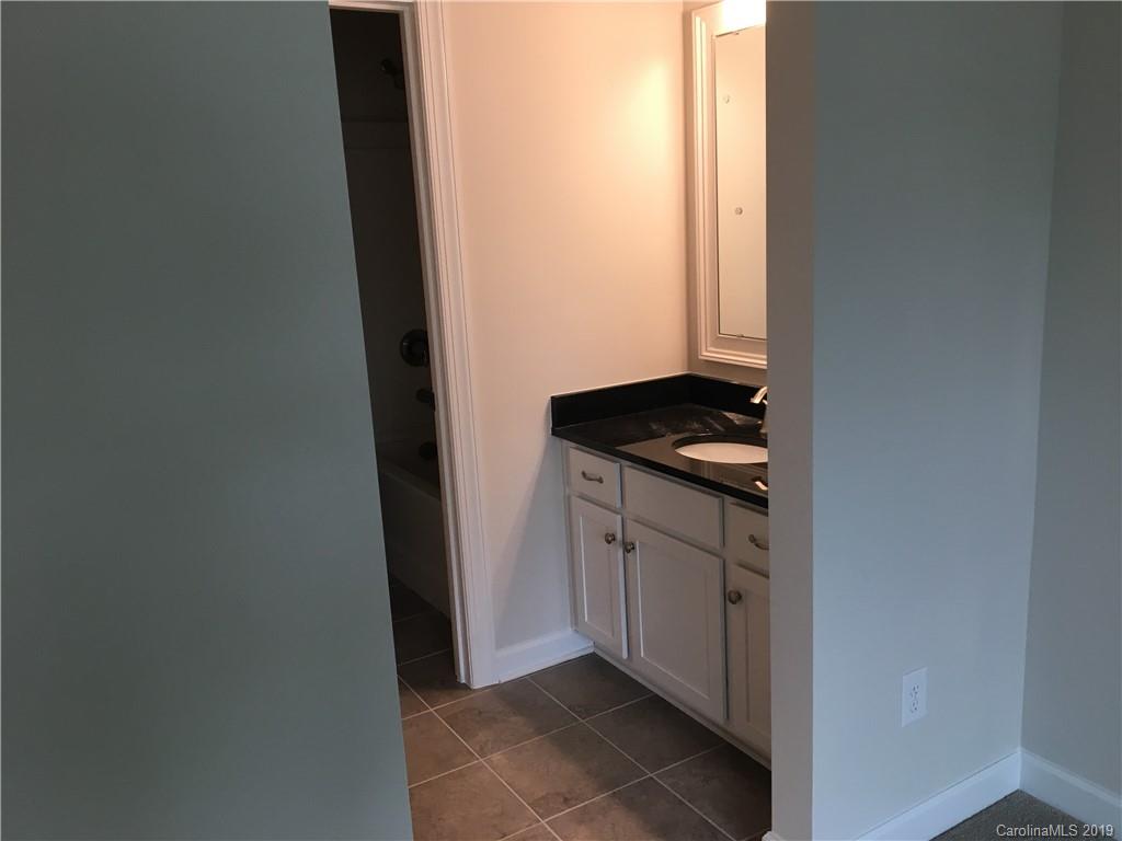 17526 Shearer Road, Unit 96 Davidson, NC 28036 - Photo 19 of 25 a kitchen with a sink