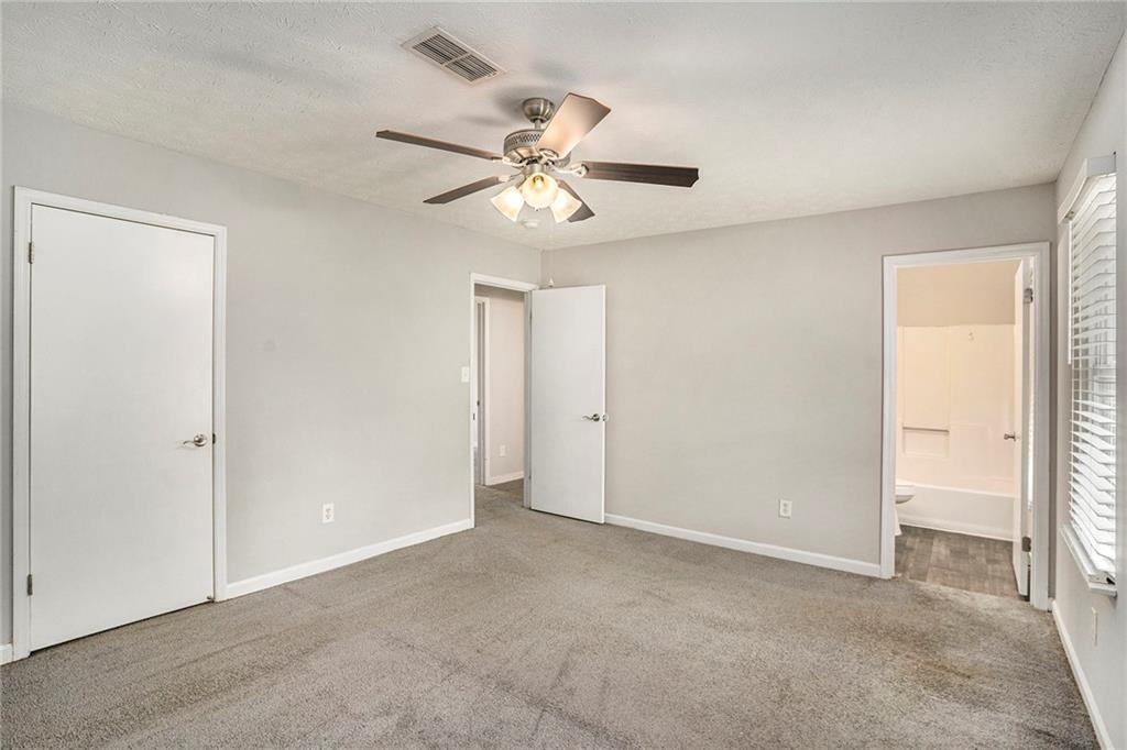 676 Tarkington Road South Stone Mountain, GA 30088 - Photo 12 of 20 a view of an empty room