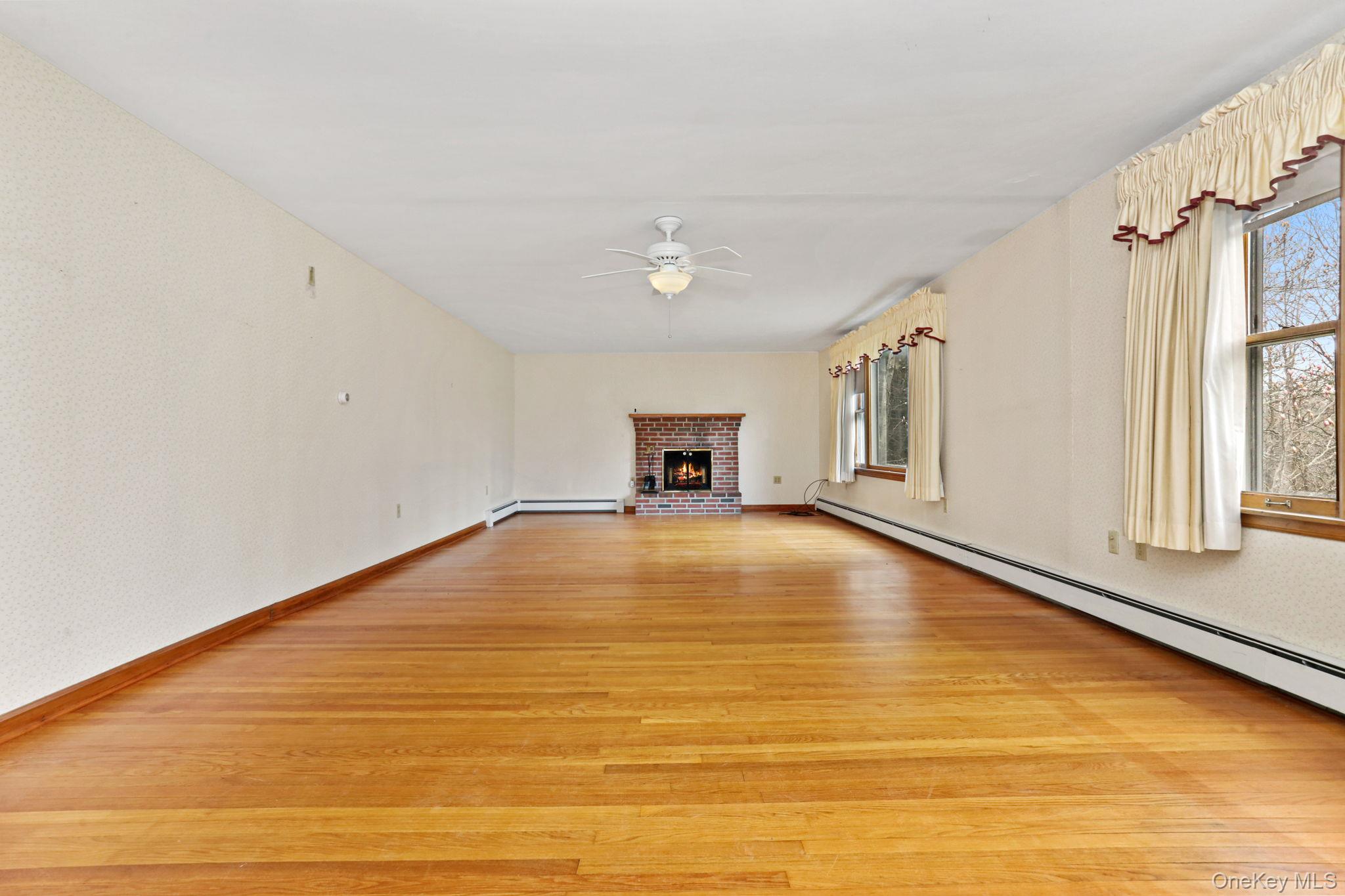 770 Gahbauer Road Hudson, NY 12534 - Photo 5 of 39 a view of empty room with a ceiling fan