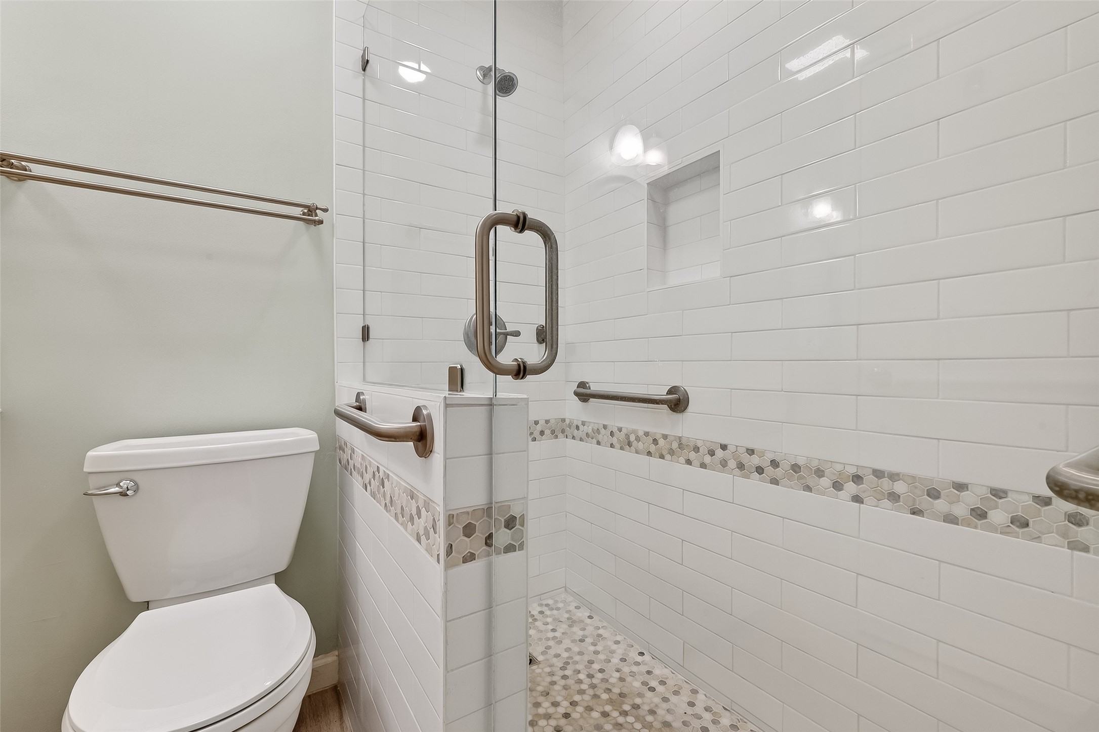 515 Tallowood Road, Unit 9 Houston, TX 77024 - Photo 14 of 18 a bathroom with a toilet sink and shower