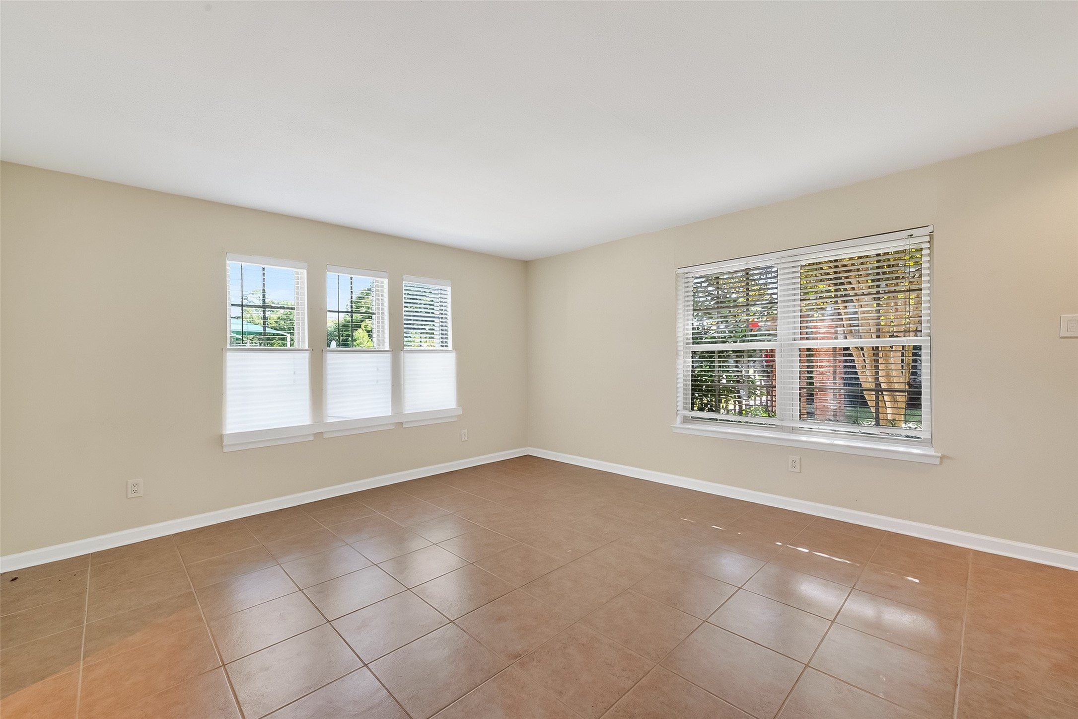 515 Tallowood Road, Unit 9 Houston, TX 77024 - Photo 5 of 18 an empty room with windows