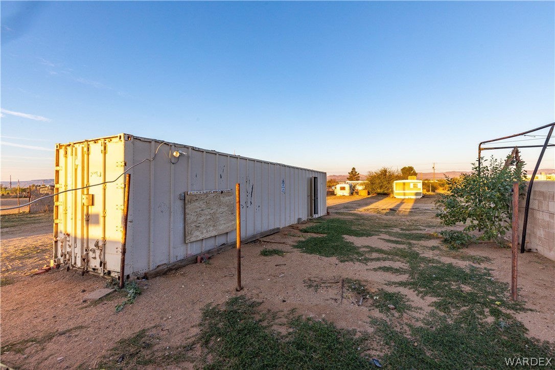 3345 Heber Road Golden Valley, AZ 86413 - Photo 34 of 44 a view of a house with a backyard