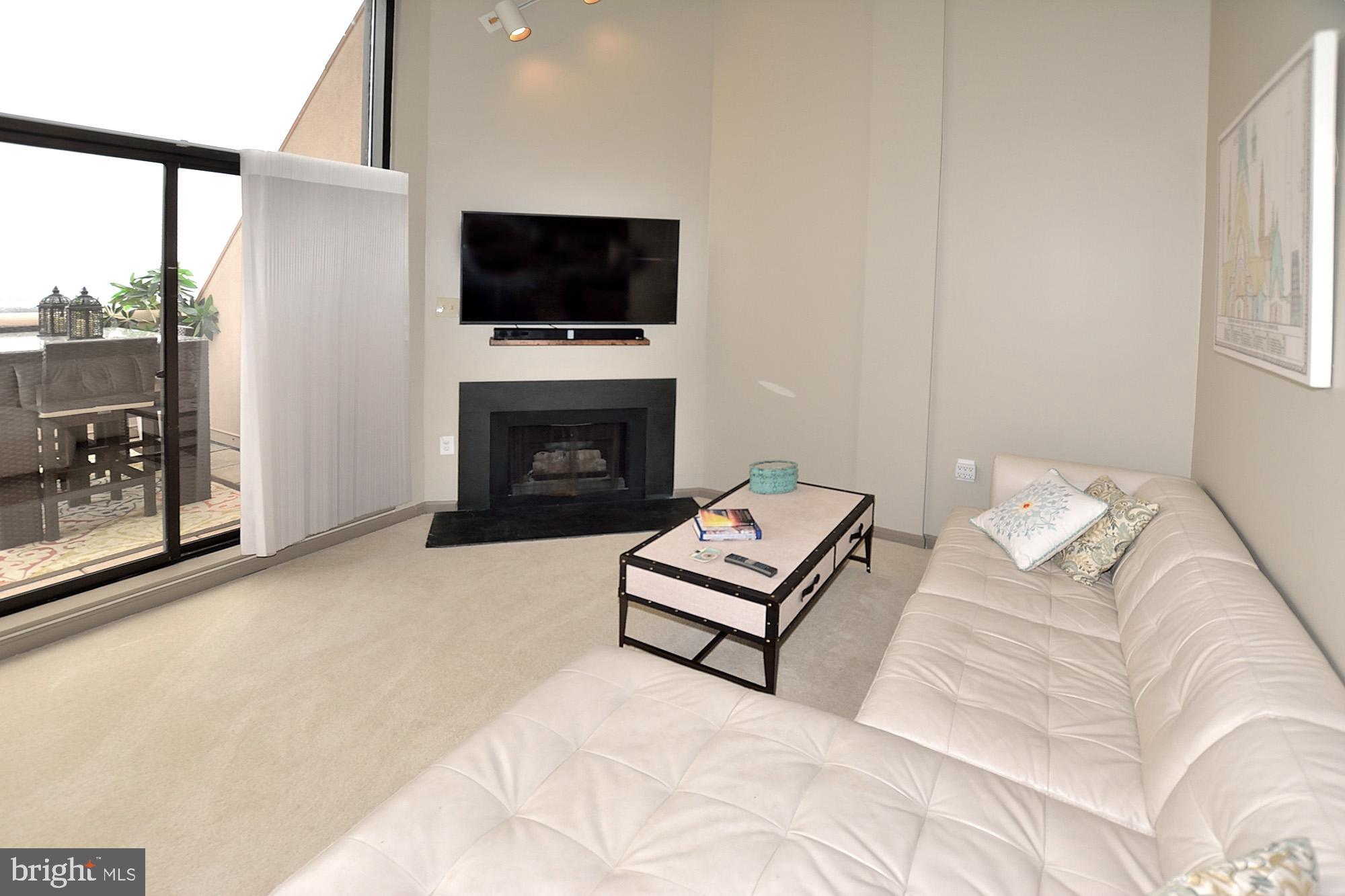 1301 North Courthouse Road, Unit 1809 Arlington, VA 22201 - Photo 10 of 36 GREAT ROOM- COZY GAS FIREPLACE