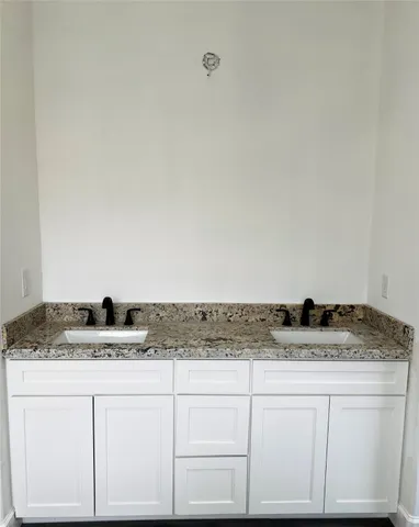 an empty room with wooden floor