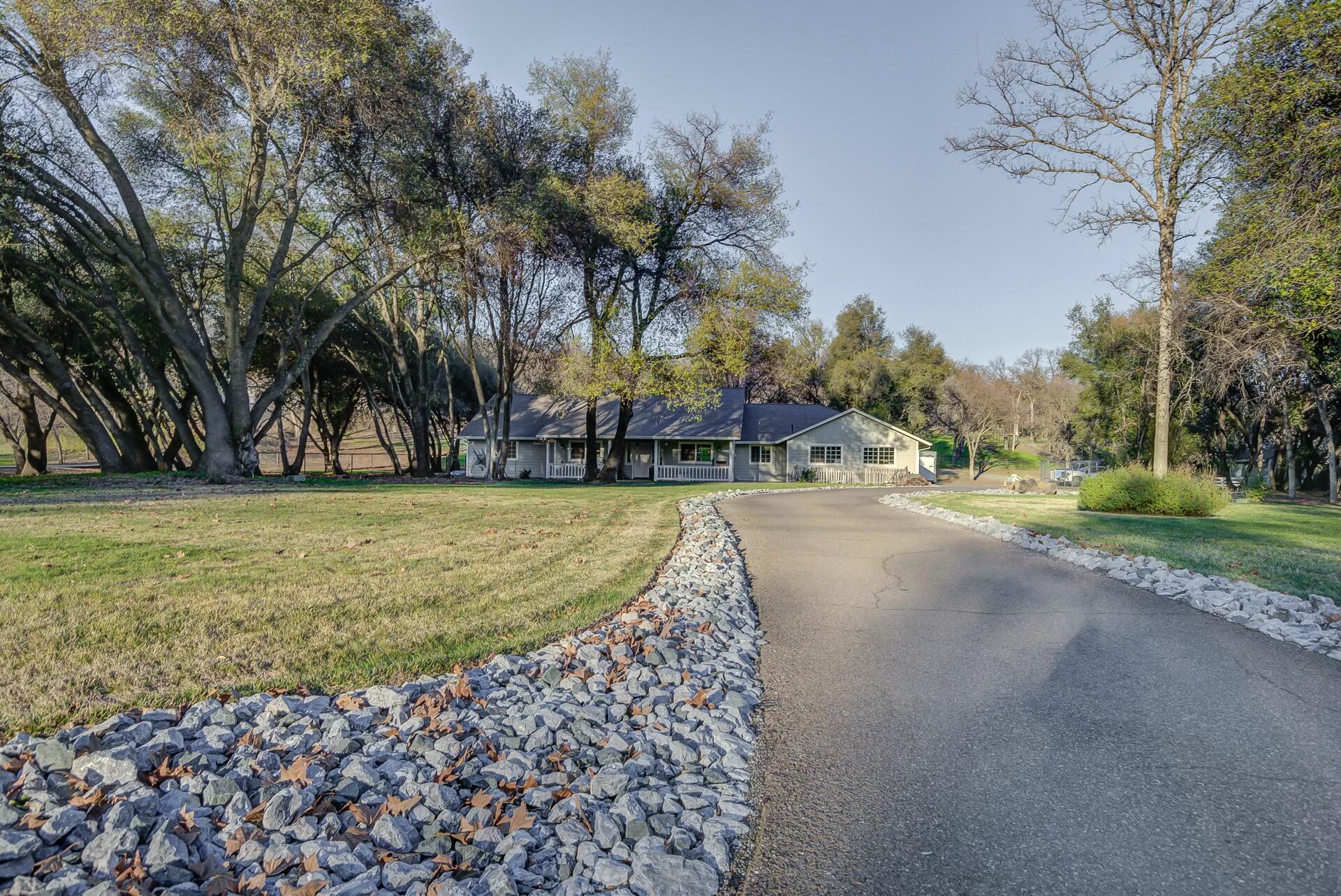 14300 Molluc Drive Red Bluff, CA 96080 - Photo 2 of 48 a view of yard with green space