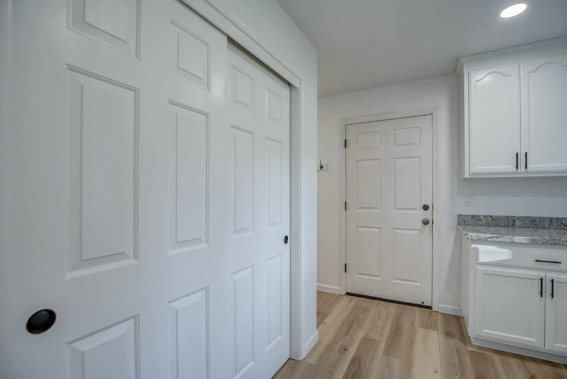 14300 Molluc Drive Red Bluff, CA 96080 - Photo 27 of 48 a view of a kitchen with white cabinets