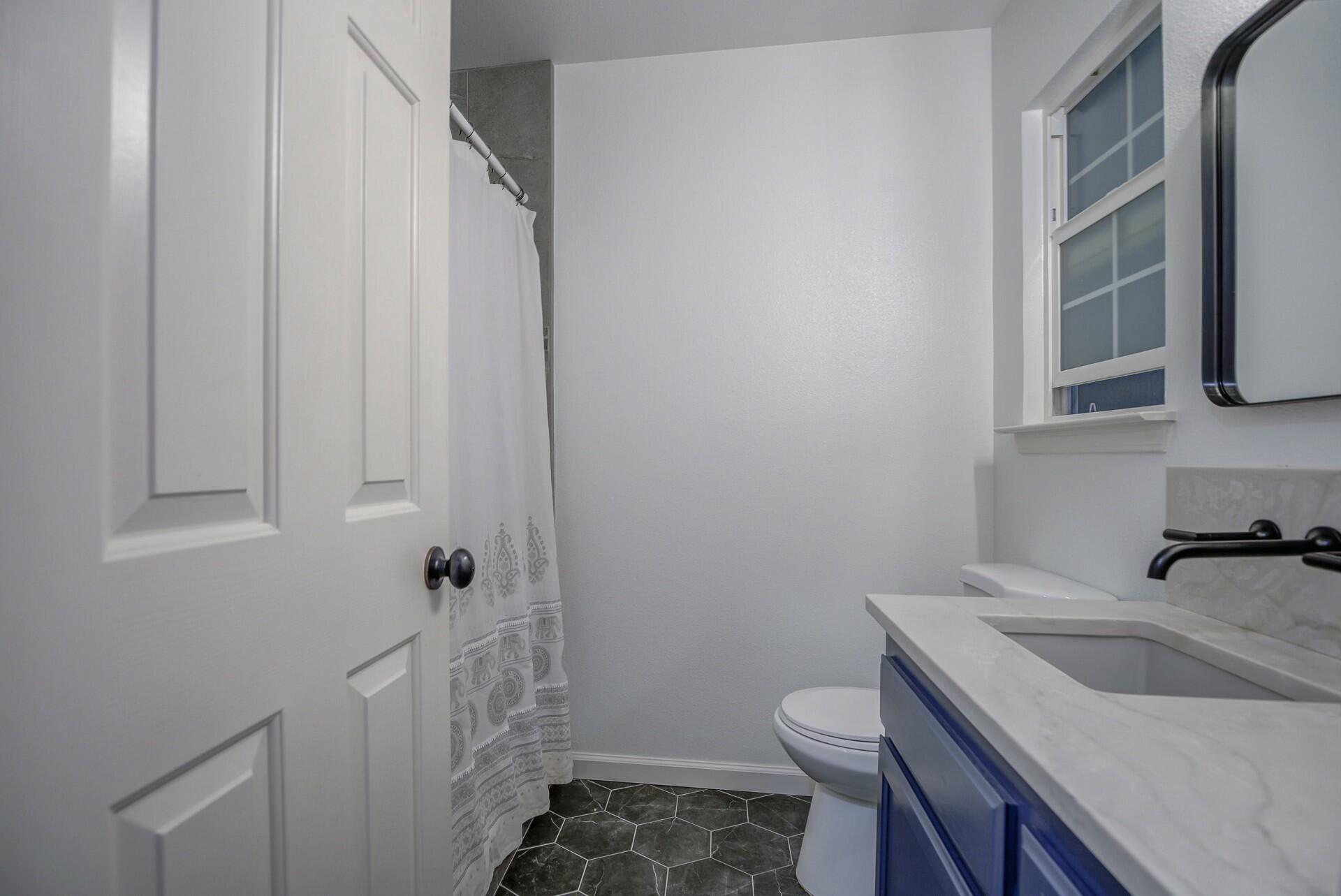 14300 Molluc Drive Red Bluff, CA 96080 - Photo 31 of 48 a bathroom with a sink toilet and shower