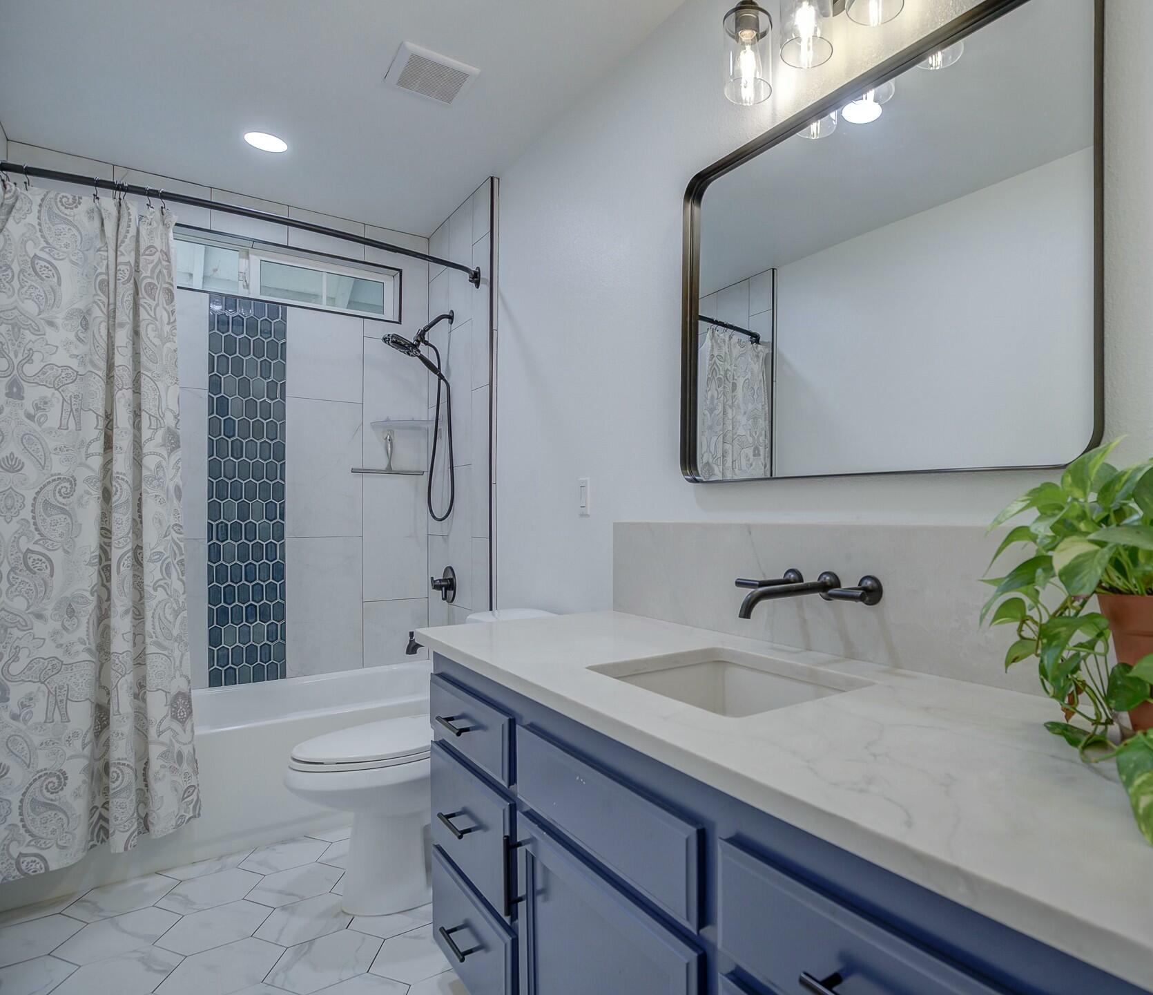 14300 Molluc Drive Red Bluff, CA 96080 - Photo 38 of 48 a bathroom with a sink a toilet and shower